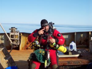 Getting kitted out to dive. Its amazing how fast the weather can changed on the Gerorges Banks, two hours later this blue sky was obscured by pea soup fog.